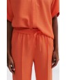 HER. koraalkleurige losse broek