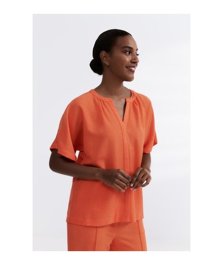 HER. koraalkleurige bloes met korte mouw