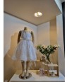 MISS LEOD champagnekleurige jurk met bloemmotief